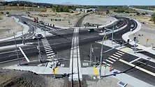 An intersection with a railroad in the middle.