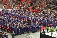 Graduates at a ceremony.