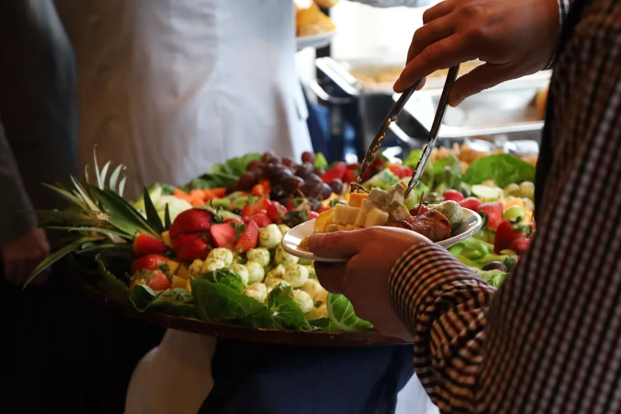 A fruit and cheese tray.