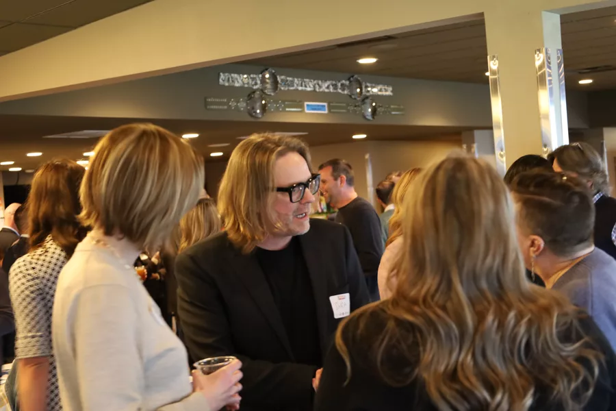 A group of people talking.