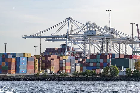 Stacked shipping containers at the Port of Seattle.