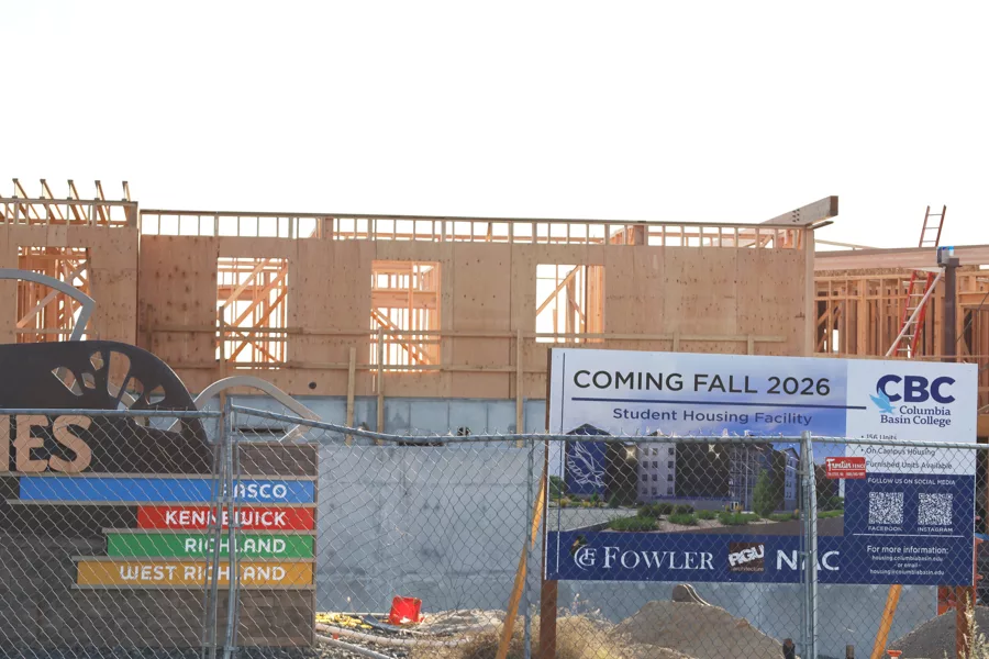 Student housing construction at CBC. There is a sign that says, "Coming Fall 2026".