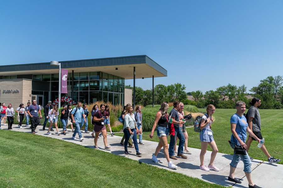WSU students walking on a path.