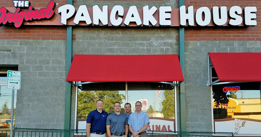 The Original Pancake House opens next year in Kennewick and Richland. The men behind the venture are Ryan Medford, co-owner, from left, Blake Williams, co-owner, Luke Absher, partner and director of operations, and Brian Carle, partner and director of food and beverage. They are in front of their Tacoma location.