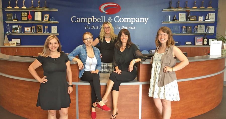 Eva Dominguez, from left, Monica Silva, Nichole Stephens, Megan Marquez and Ciara Thornhill show off the newly expanded reception area at Campbell & Co. headquarters in Pasco.
