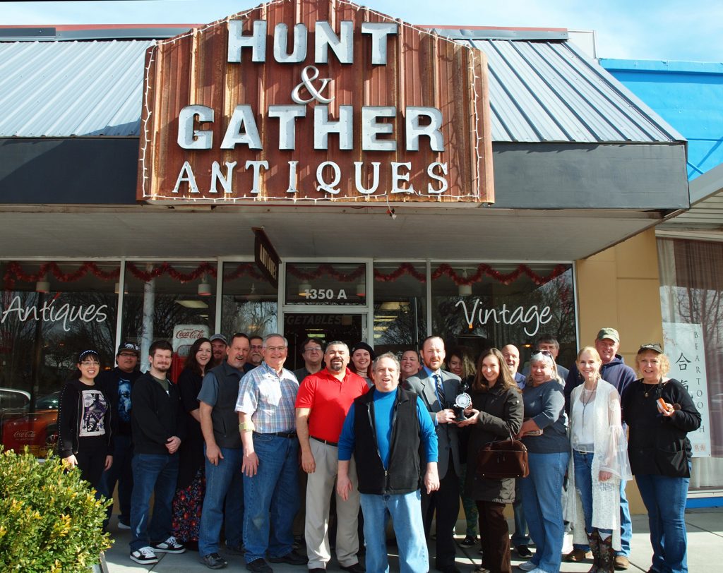 The 2047 Productions cast and crew with Hunt & Gather Antiques owners, Paul and Cheryl Ziemer, outside their shop in Richland’s Uptown Shopping Center, which served as one of the sets for 2047 Productions’ “Strowger’s Revenge,” currently in production. 