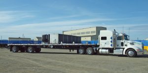 Hittman Transport Services moves shipping casks, vans and flatbeds throughout the United States and Canada, logging an average of eight million miles per year and 300 radioactive shipments per month. (Courtesy Hittman Transport Services)