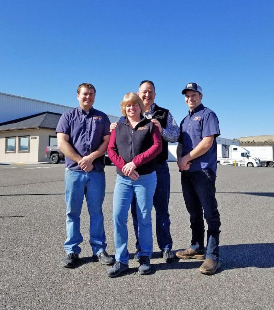 Kennewick-based Vintners Logistics LLC is operated by the Thompson family and has about 20 trucks in its fleet. From left are Michael, Shari, Robert and Derek Thompson. (Courtesy Vintners Logistics)