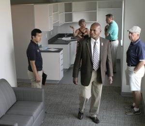 Columbia Basin College board of trustees and employees tour the nearly completed Sunhawk Hall. From left are Daniel Quock, Alissa Watkins, Duke Mitchell, Frank Murray and Ray Dunn. (Photo: Paul T. Erickson)