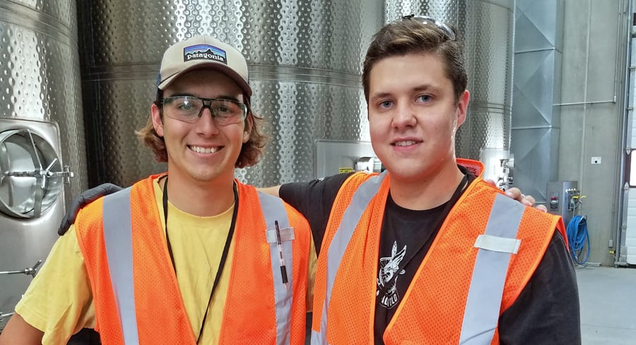 Taylor Brucher, left, and Gabriel Crowell are two of six interns joining the Four Feathers winemaking crew for 2018 harvest.