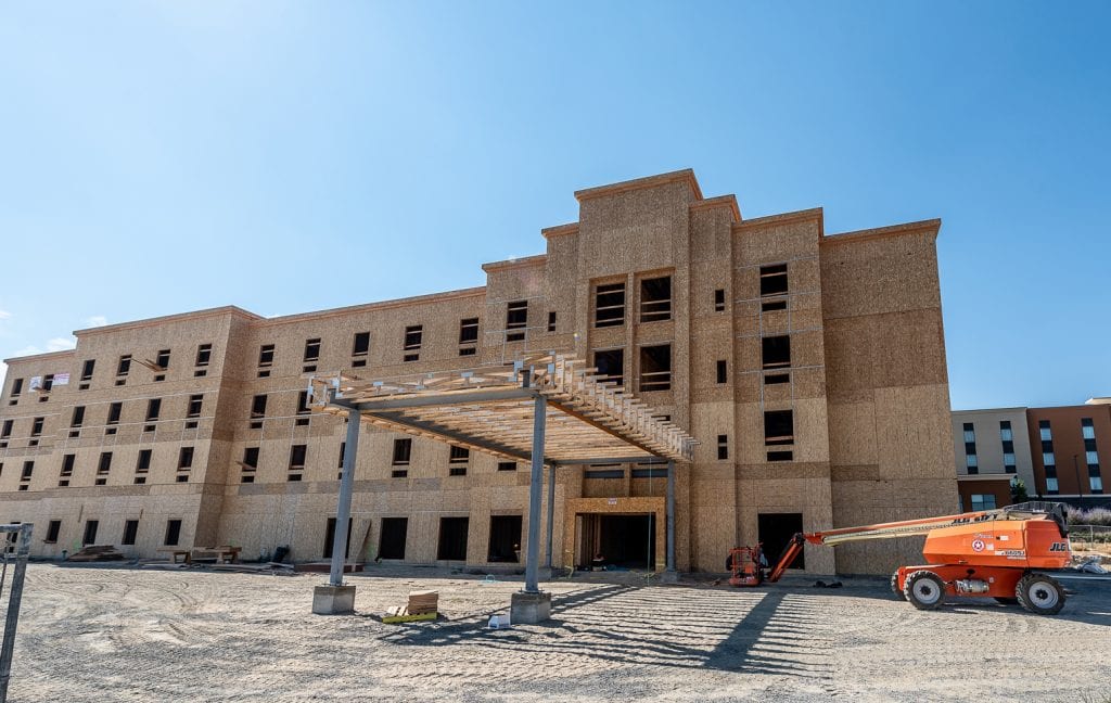 A four-story, 93-unit Comfort Suites on Plaza Way is under construction across from Trios Health in Kennewick. The project is valued at $6.5 million. (Photo: Scott Butner Photography)