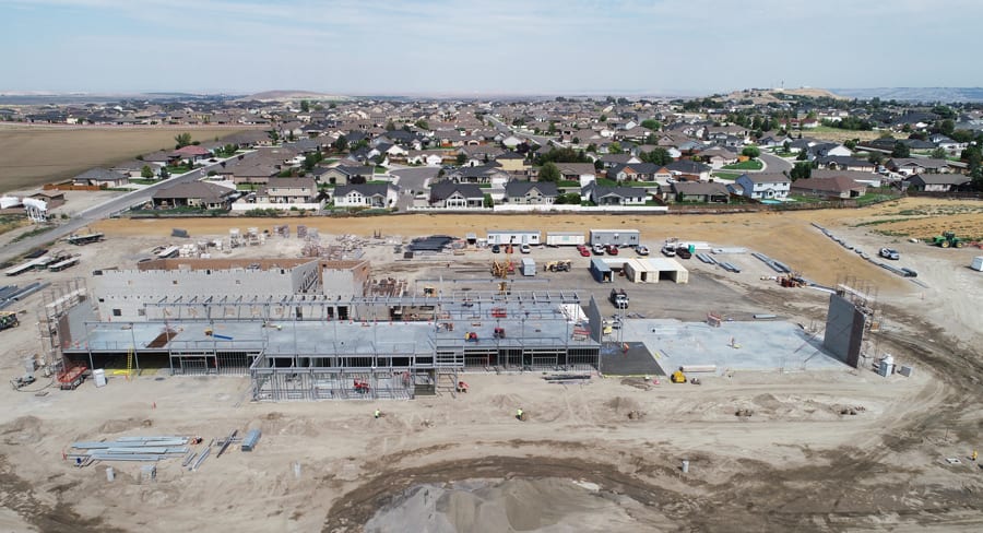 A yet-to-be-named elementary school is under construction at 2100 Sunshine Ave. in West Richland to support 600 students. It’s part of the “school-driven” commercial growth seen in the city, which has grown 4.5 percent year over year to 15,320 residents in 2018. (Photo: Richland School District)