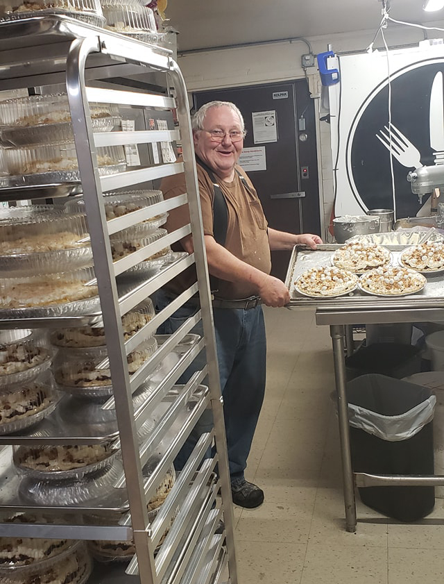 Tommy Watson helped his son Joel Watson and his staff make 246 pies at Thanksgiving. (Courtesy Joel Watson)