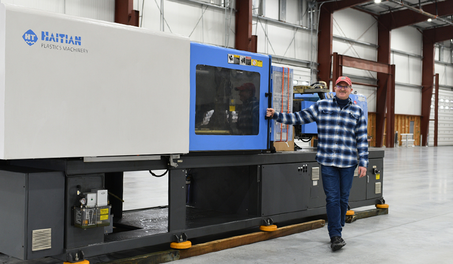 Ken Williams stands inside his new 28,000-square-foot Plastic Injection Molding manufacturing plant at 2695 Battelle Blvd. in north Richland. The new plant will allow the company to bring new capabilities, including new robotics technology.