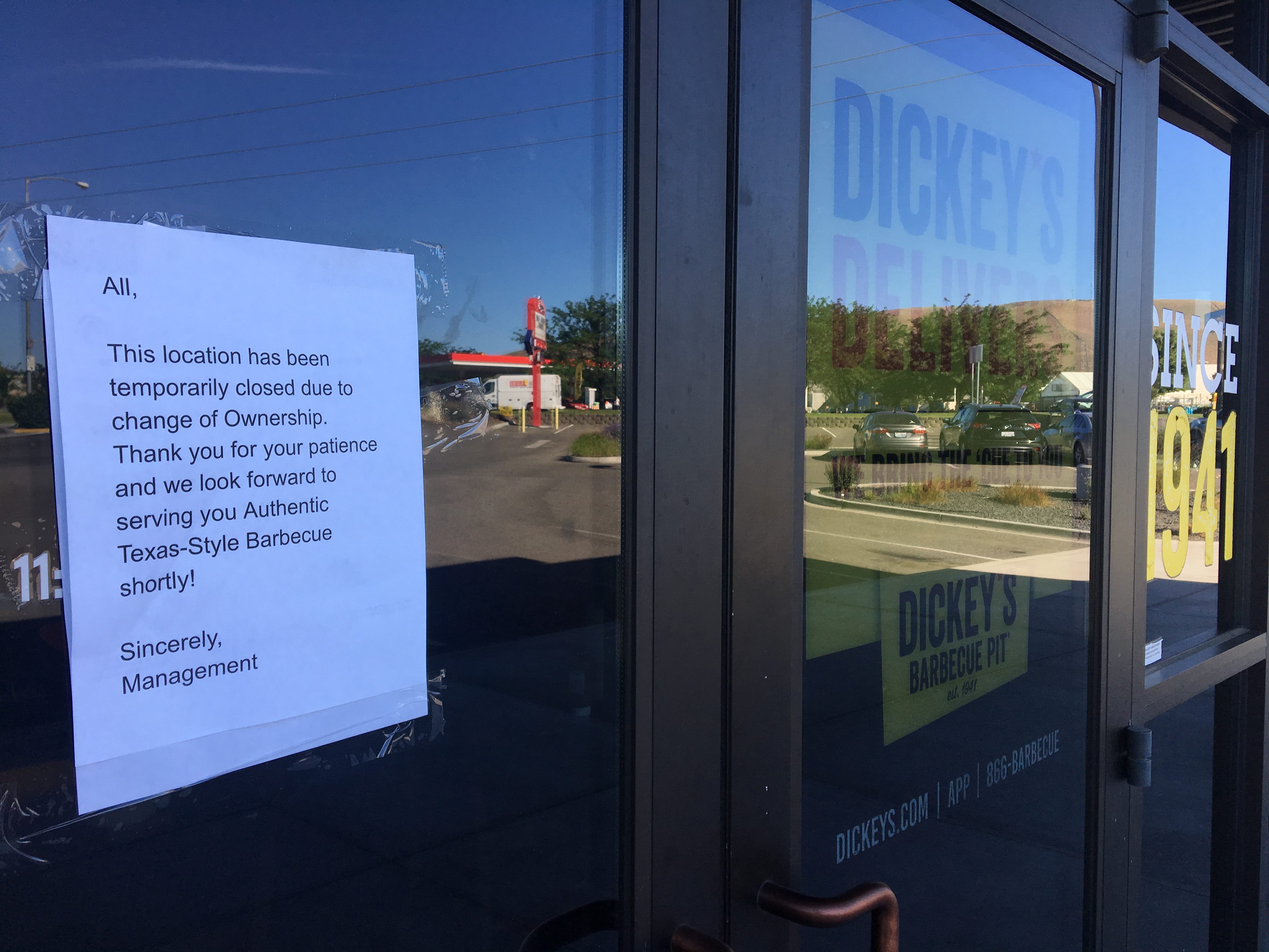 A closure sign is posted on the door of the Dickey's Barbecue Pit at 2530 Queensgate Drive in Richland.