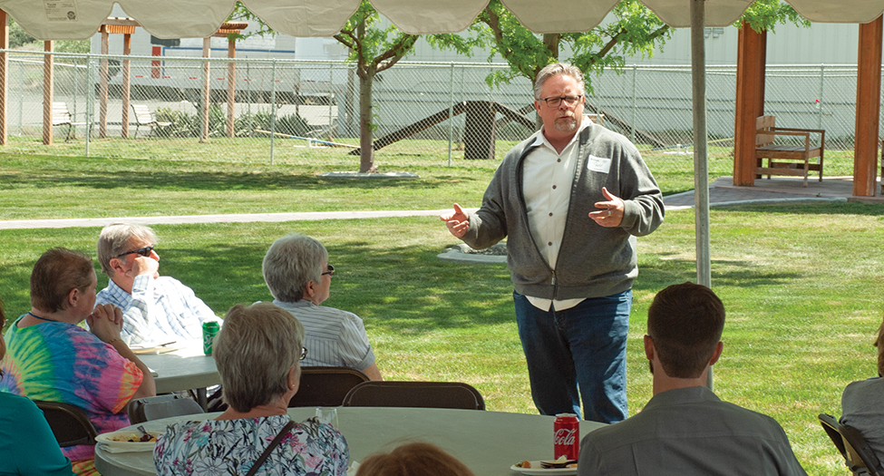 Todd Halterman speaks at the Benton-Franklin Humane Society’s Feel the Love event about Our Forever Friends, a pet protection plan that enables pet owners to allocate money in their estate to pay for their pets’ long-term care after their death. (Photo by Laura Kostad)