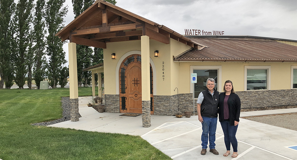Pat Tucker and his daughter Jamie Ssenkubuge stand outside their Paterson tasting room for their nonprofit Water from Wine, which donates wine sale profits to organizations working to bring clean water to communities around the world. (Courtesy Jamie Ssenkubuge/Water from Wine)
