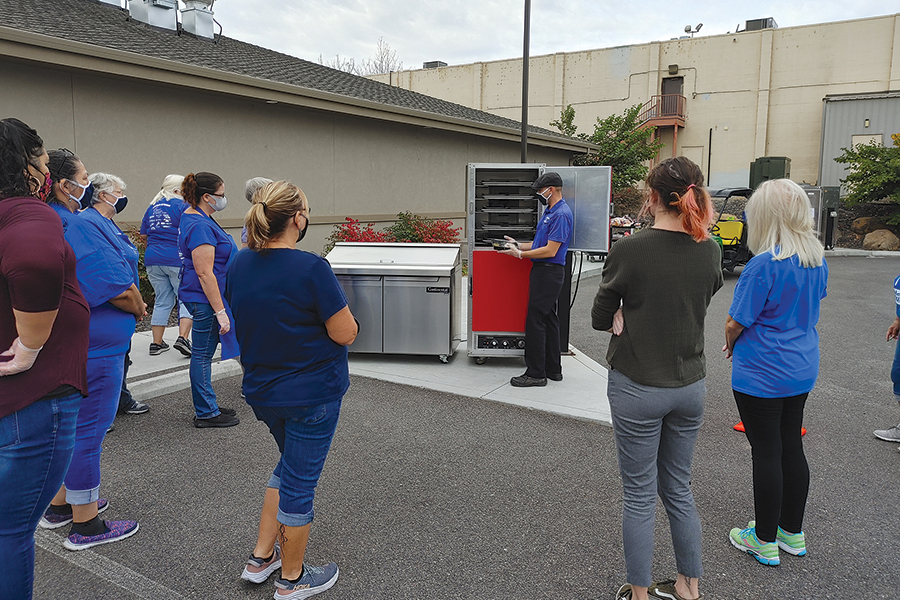Meals on Wheels returns to serving up curbside hot lunches