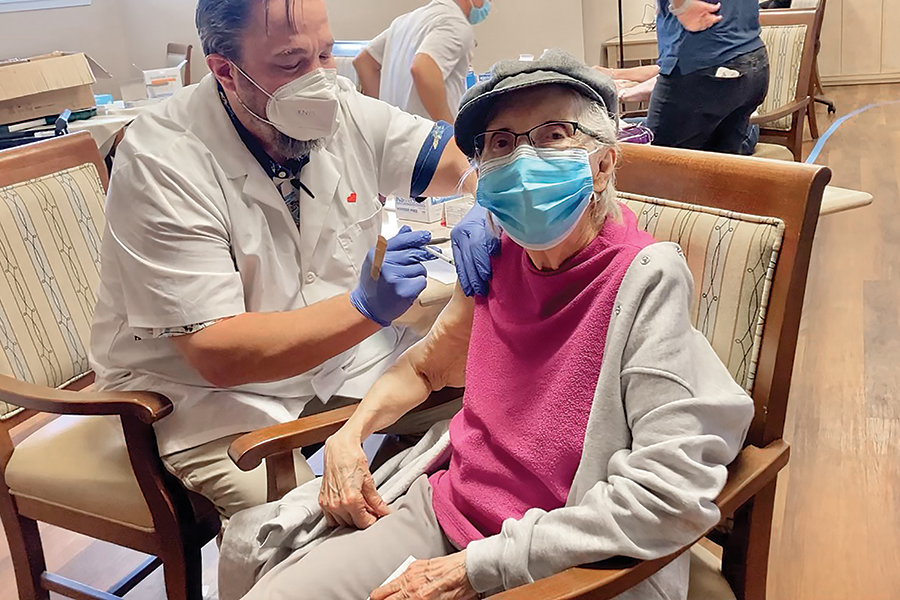 Joyce Green, a resident at Brookdale Canyon Lakes senior living community in Kennewick, receives the Covid-19 vaccine on Jan. 14. “I was elated,” she said. (Courtesy Joe Green)