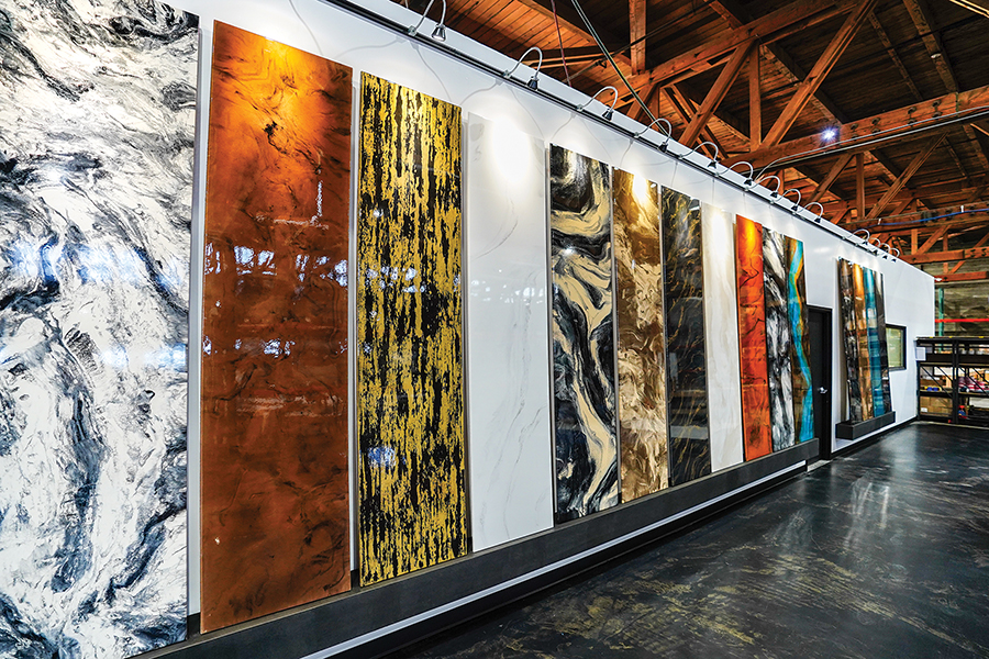 A variety of epoxy finishes take center stage in Leggari Products’ Pasco warehouse. “We wanted it to have the look and feel of an art gallery because every kit installed is a unique representation of the installer,” said Tylor Svangren, co-founder. (Courtesy Leggari Products)