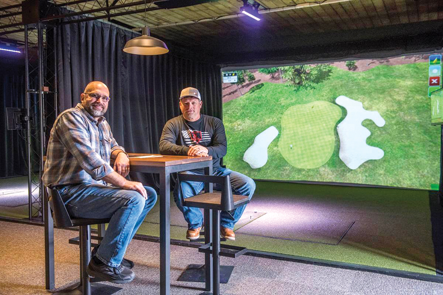 Divots Golf owners Monty Buell, left, and Henderson Orchard plan to open Divots Golf at 2450 N. Columbia Center Blvd. in Richland in late August. It will be their third location, with two more opening, in September – one in Lewiston, Idaho, and the other in Anchorage, Alaska. (Courtesy Divots Golf)