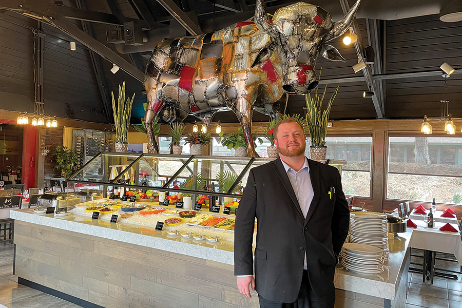 Nate Taylor is general manager of Boiada Brazilian Grill, a restaurant that opened in Kennewick and is expanding to Spokane. (Photo by Robin Wojtanik)