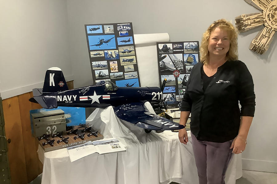 Malin Bergstrom, president of Bergstrom Aircraft Inc. in Pasco, said more people are signing up for flight lessons than ever. Her company also offers maintenance services and aircraft and hangar rental. She is pictured in the Pasco Aviation Museum. (Photo by Jeff Morrow)