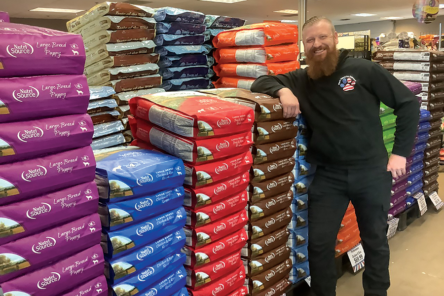 Steve Carroll of Paw’s Natural Pet Emporium vets all the food sold at his Kennewick store. The store’s mission is to sell American-made high quality pet food free of corn, soy, wheat, artificial flavors and color. (Photo by Jeff Morrow)