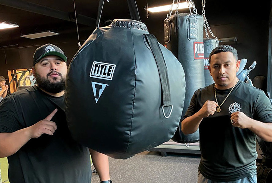 Jose Limon, left, and Guty Villa run Mana A Mano Boxing Club in Kennewick. It opened in June. (Photo by Jeff Morrow)