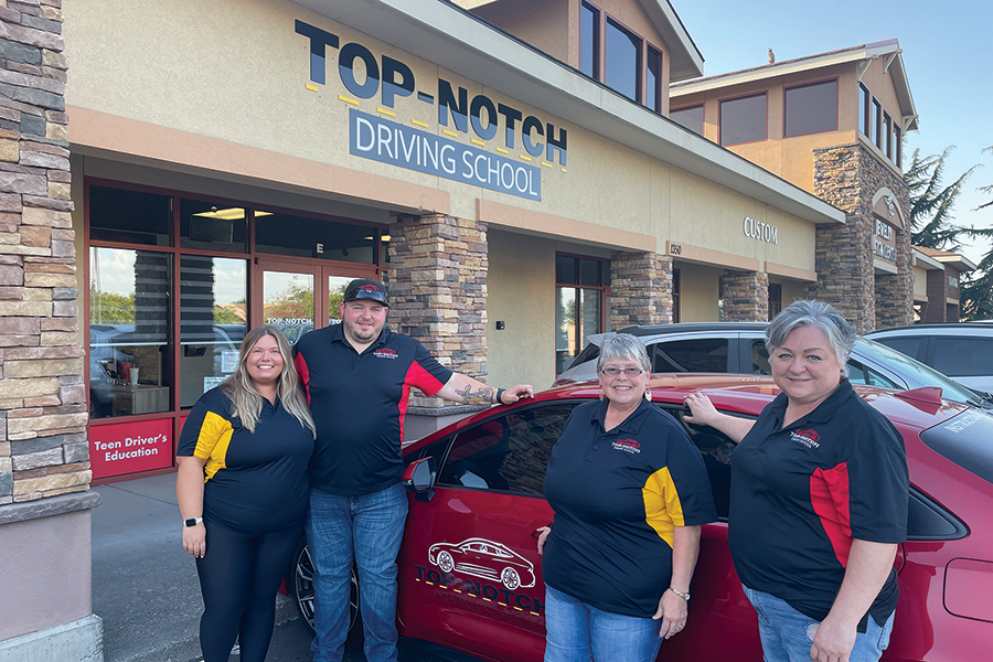 A new driving school has pulled into town. Top-Notch Driving School at 1350 N. Louisiana St., Suite E, opened in Kennewick this summer. From left are: co-owners Kaylea and Steven Nundahl, lead instructor Pam Homer and co-owner Myel Nundahl. (Photo by Robin Wojtanik)
