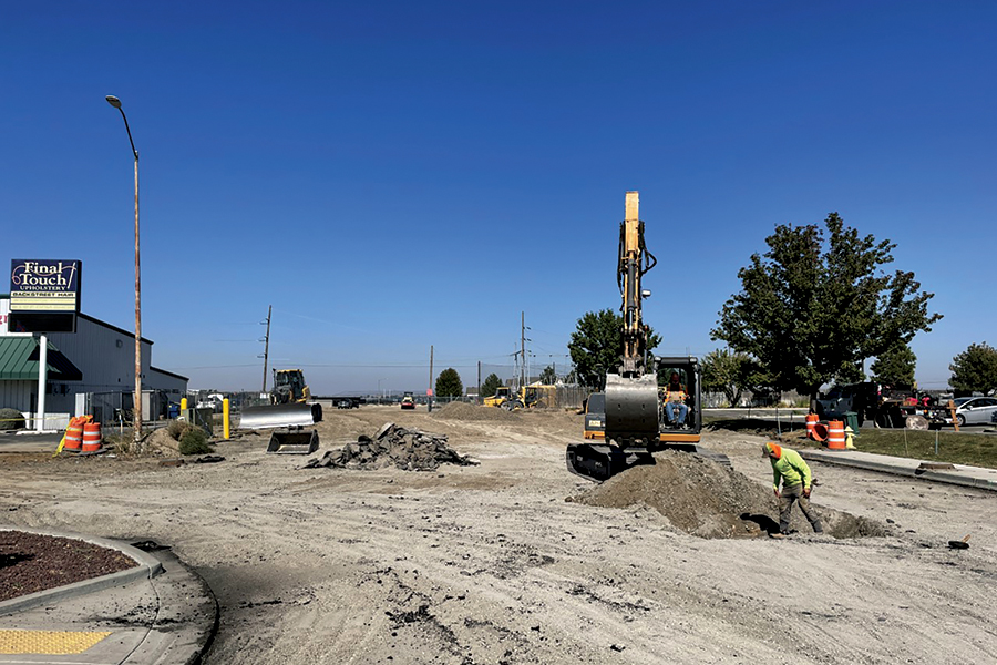 Premier Excavation works to connect the two sides of Center Parkway behind Columbia Center mall at the Richland-Kennewick border. (Photo by Kristina Lord)