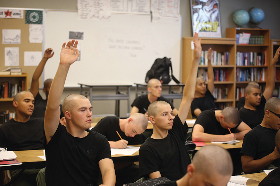 The Washington Military Department is considering adding a second campus for its Youth Challenge Academy in Richland. Above, students at the original youth academy in Bremerton raise their hands during class. (Courtesy Washington Military Department)