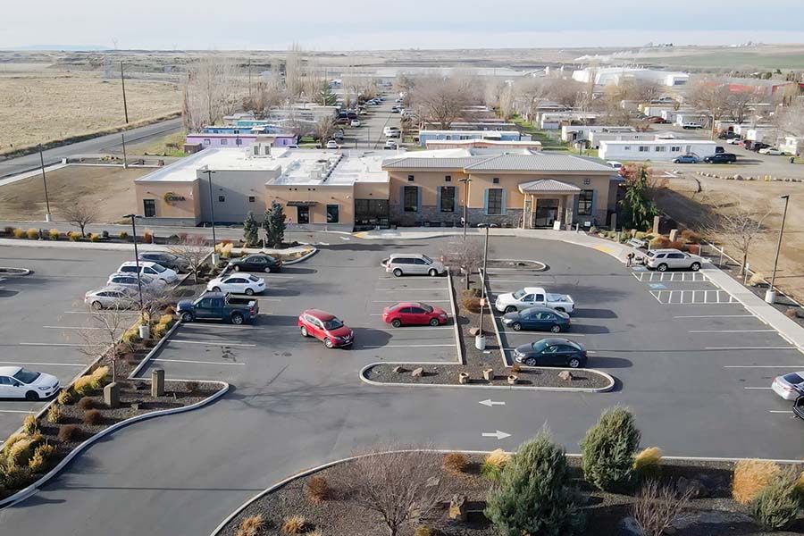 Columbia Basin Health Association is planning to build a new clinic in Pasco at the northeast corner of North Road 68 and Three Rivers Drive. CBHA operates three other clinics in Othello, Connell and Mattawa, providing medical, dental, mental health, eye care, pharmacy and more all under one roof. Pictured is the Connell clinic. (Courtesy Columbia Basin Health Association)