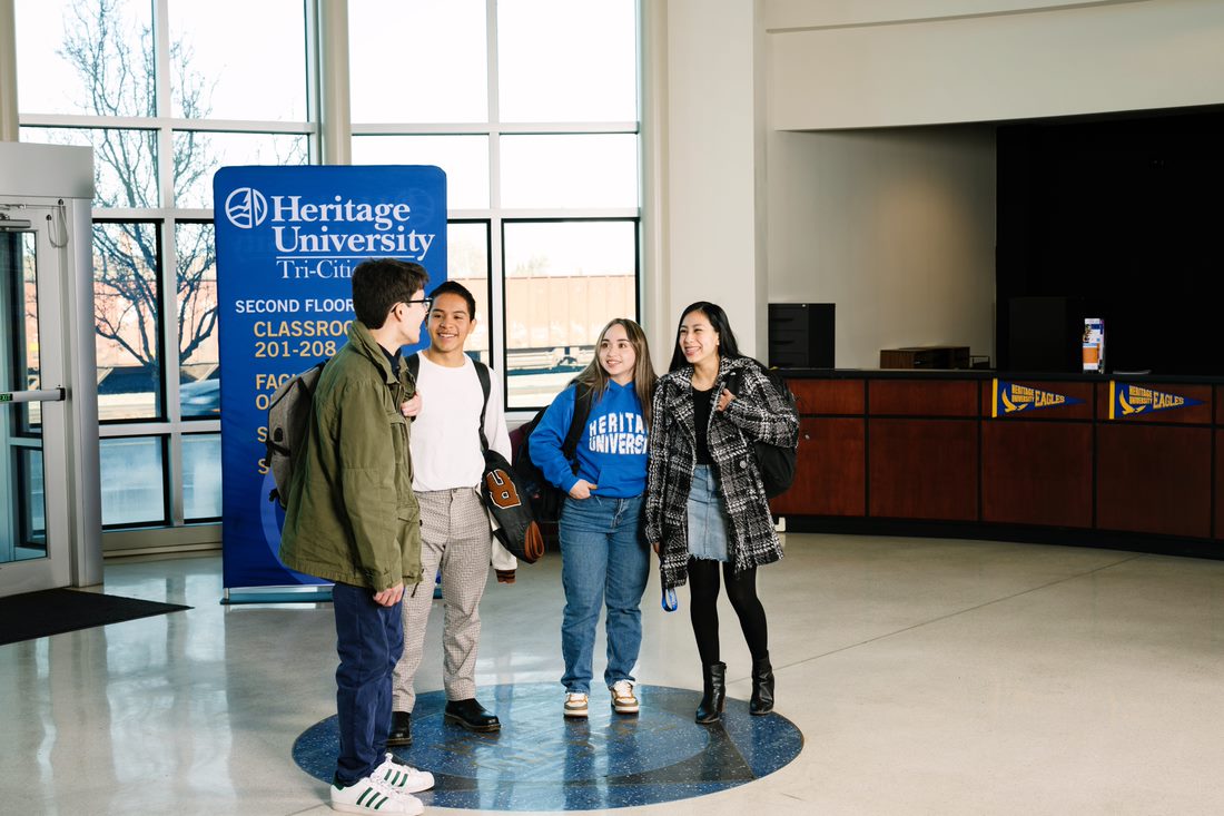 Heritage University is opening a future campus at 333 W. Canal Drive in downtown Kennewick. From left are Eldrick Knapp, Johny Sleider Turciog Garcia, Viviana Aguilar and Noemi Mendoza Santiago. (Courtesy Heritage University)