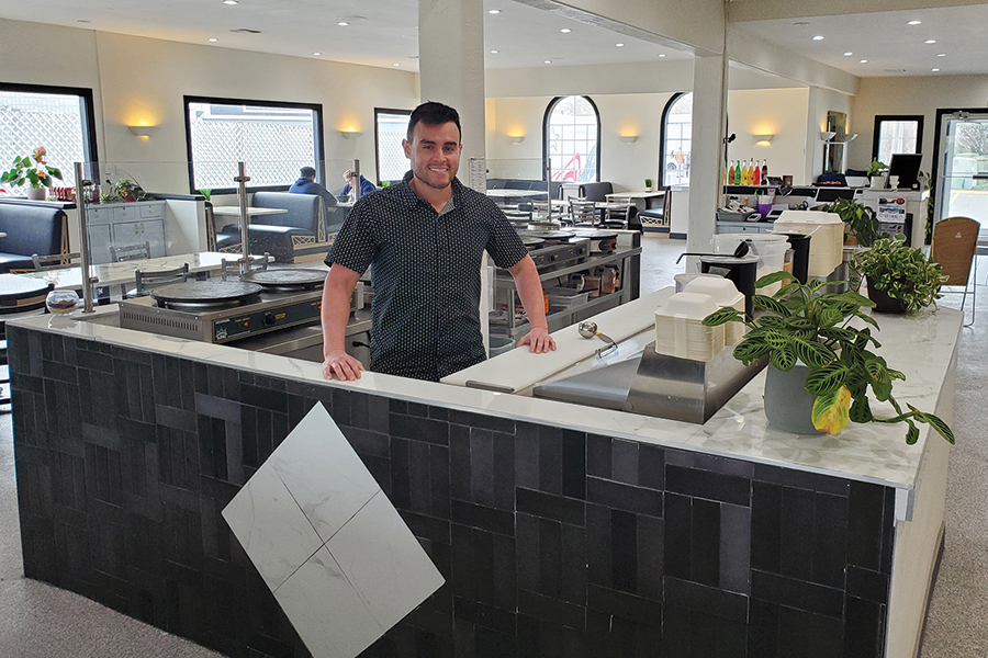 Al Avelar stands in the open concept crepe kitchen at his new restaurant, Crepe Haus + El Compadre at 2100 N. Belfair St. in Kennewick. The restaurant features two diverse menus, crepes and Mexican.  (Photo by Laura Kostad)