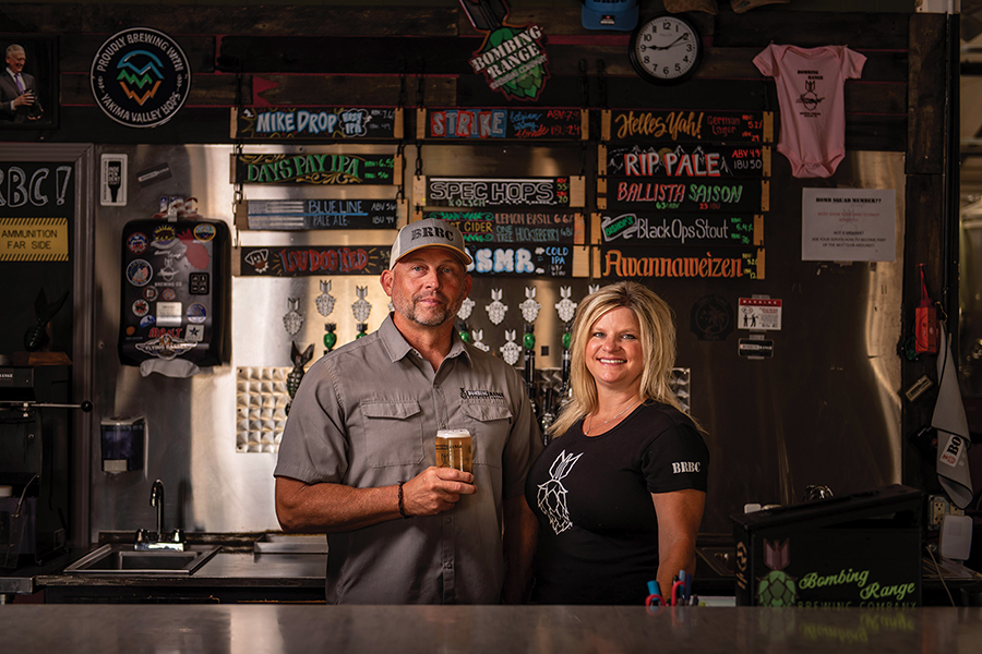 Mike and Dashia Hopp are buying the building that’s home to their Bombing Range Brewing Company and The Dive, opening the door to further expansion. (Photo by Ryan Jackman)
