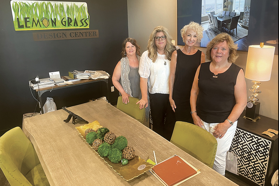 Lemon Grass Gifts’ design center offers 3D technology to showcase how different color palettes, materials and styles look in a home before buying any furniture or decor. The Lemon Grass team consists of, from left, Robbi Nieman, who handles customer service; decorating specialists Melanie Pasco and Sarita Tomlinson; and owner Linda Pasco. (Photo by Robin Wojtanik)