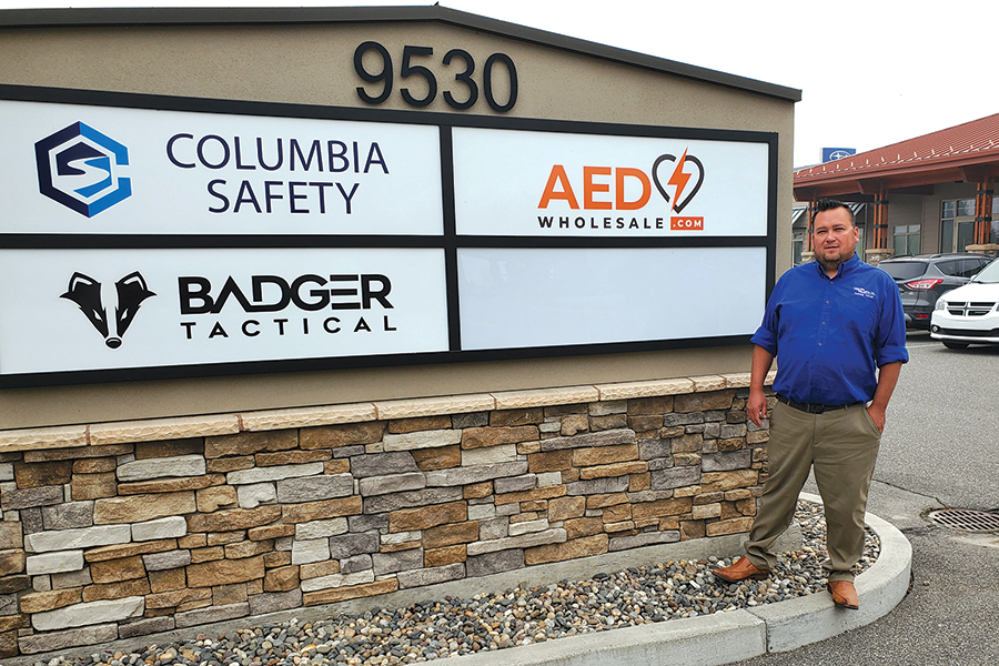 Nathan Kennedy, owner of Columbia Safety LLC, stands in front of the new headquarters for his businesses at 9530 Bedford St. in Pasco. Columbia Safety offers a full slate of medical training courses from basic first aid and CPR to advanced emergency medical technician (EMT) and nursing courses. Kennedy also owns Columbia Safety Medical, AED Wholesale and Badger Tactical. (Photo by Laura Kostad)